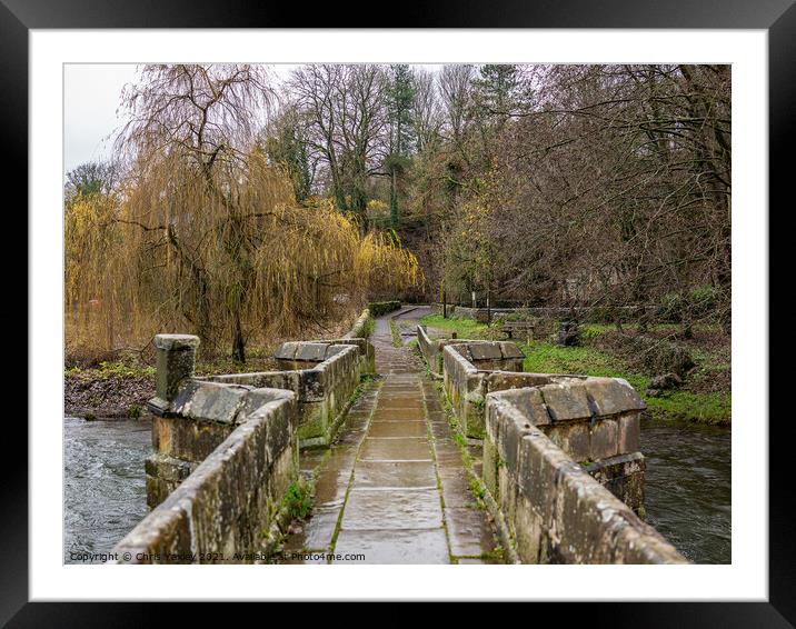Stone bridge over a raging River Wye, Bakewell Framed Mounted Print by Chris Yaxley