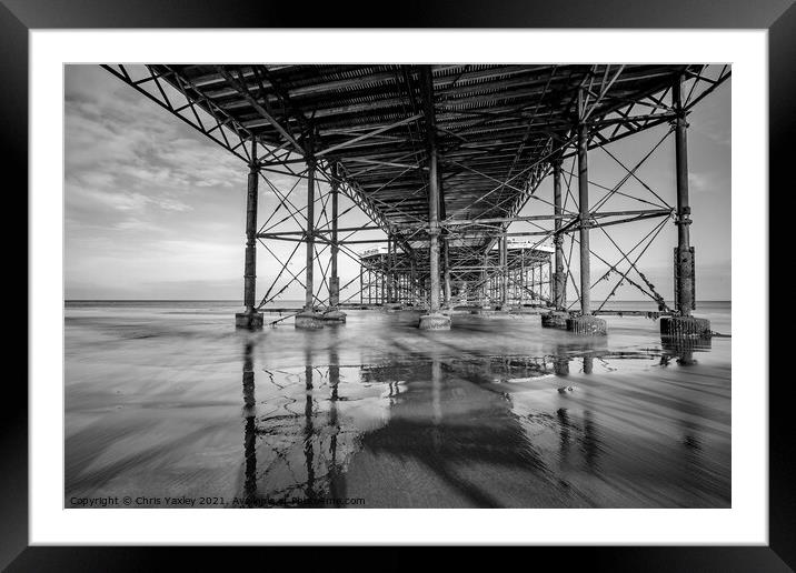 Beneath the boardwalk of Cromer pier Framed Mounted Print by Chris Yaxley