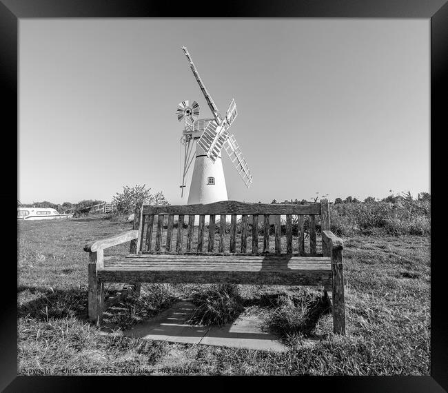 Bench on the River Thurne Framed Print by Chris Yaxley