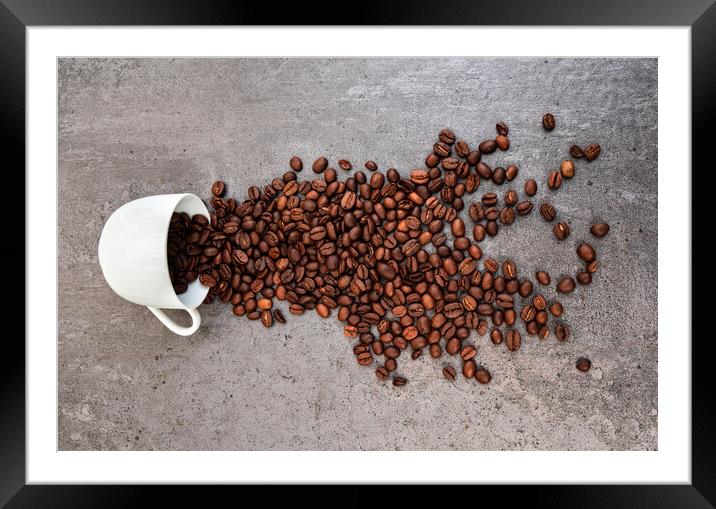 Spilled cup of coffee with beans  Framed Mounted Print by Laurent Renault