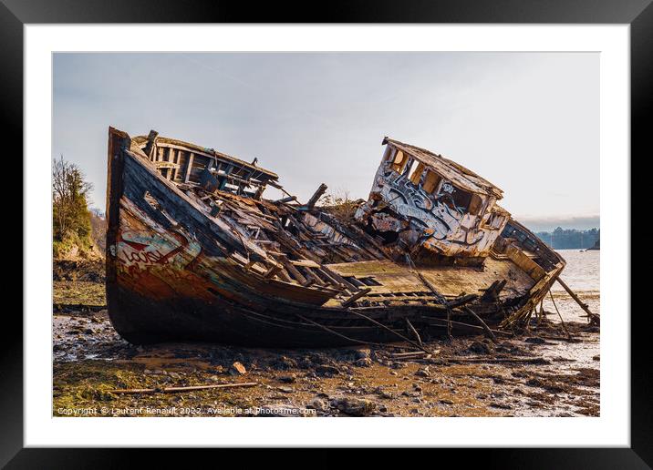 Wreck of a wooden fishing boat abandoned Framed Mounted Print by Laurent Renault