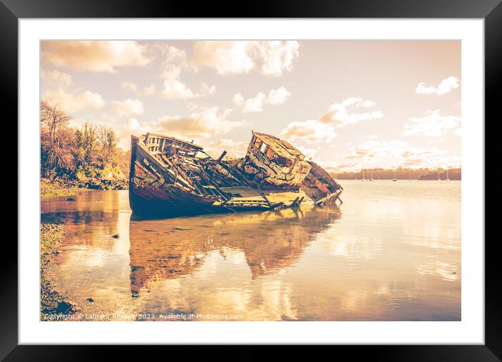 Wreck of a wooden fishing boat abandoned on the shore Framed Mounted Print by Laurent Renault