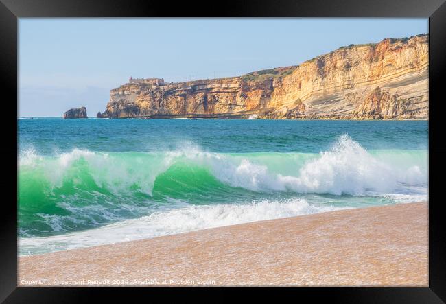 Wave and cliffs in Atlantic Ocean on the beach in Nazaré, Portu Framed Print by Laurent Renault