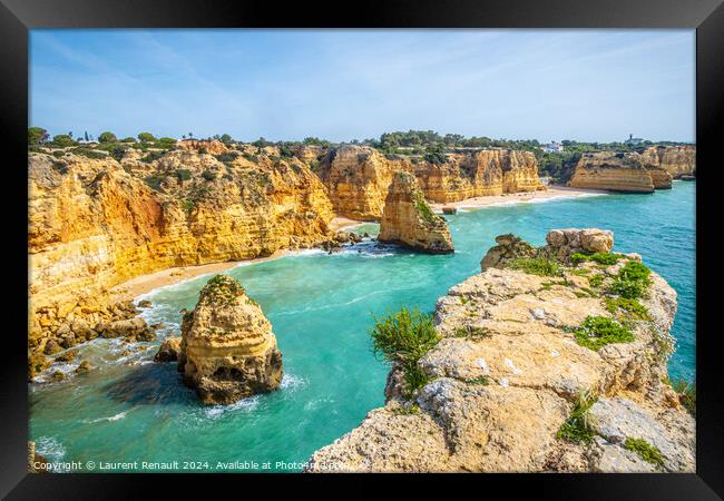 Spectacular cliffs and beach photographed near Praia da Marinha  Framed Print by Laurent Renault