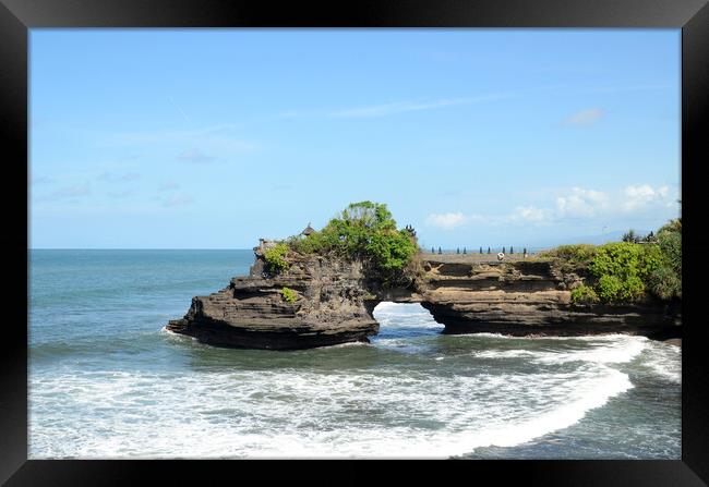 Pura Batu Bolong in the rock in Bali, Indonesia Framed Print by Yann Tang