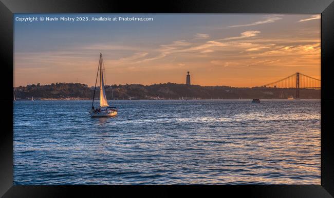 A sailing yacht on the River Tagus Lisbon, Portugal Framed Print by Navin Mistry