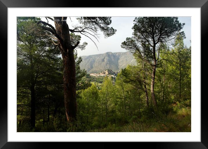 Guadalest, Spain seen from a the surrounding forest  Framed Mounted Print by Navin Mistry