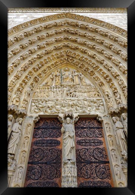 The ornate doorway of Notre Dame Cathedral, Paris, France Framed Print by Navin Mistry