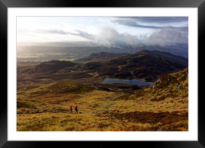 Walkers descend from Ben Vrackie, near Pitlochry Framed Mounted Print by Navin Mistry