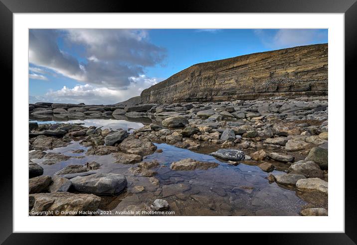 Rocky pools on the beach at Monknash Framed Mounted Print by Gordon Maclaren