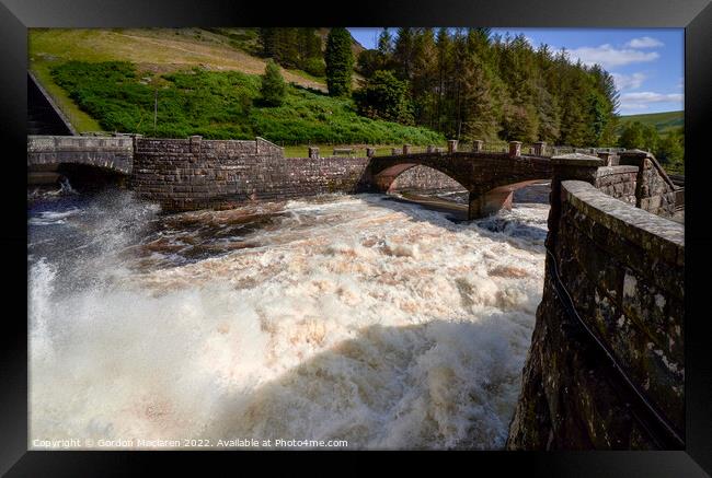 Water gushing out of Clearwen Dam, Powys, Wales Framed Print by Gordon Maclaren