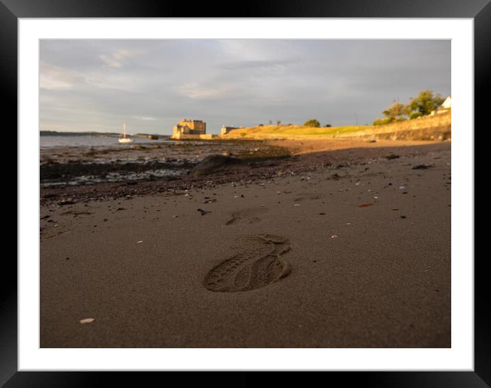 Footprint in the sand. Framed Mounted Print by Emma Dickson