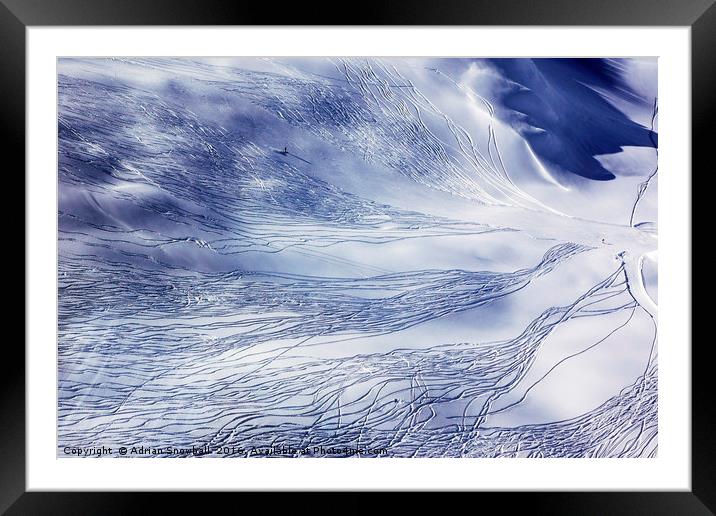 Ski trails Framed Mounted Print by Adrian Snowball