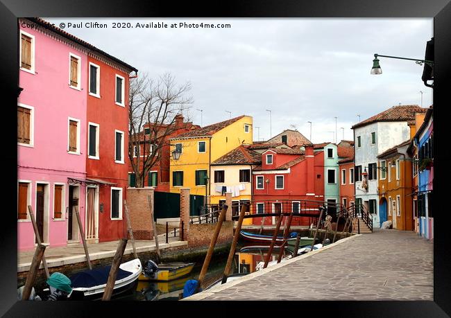 The pretty cottages on Burano island. Framed Print by Paul Clifton