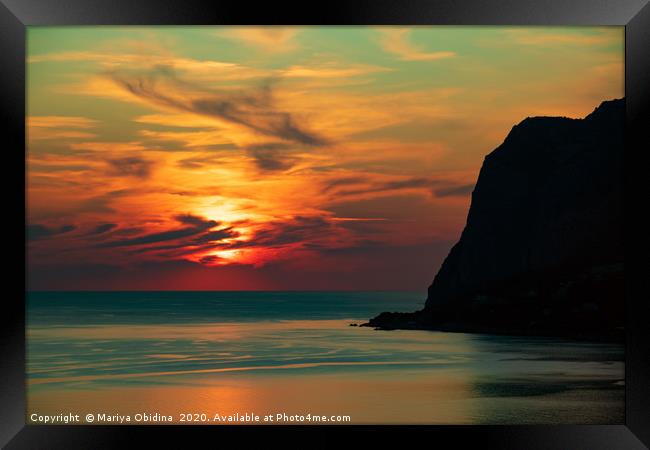 Amazing sunset on the sea coast. Framed Print by Mariya Obidina