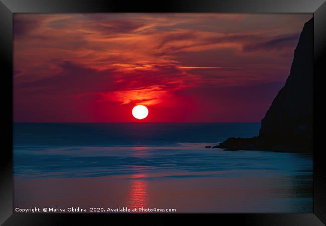 Amazing sunset on the sea coast. Framed Print by Mariya Obidina