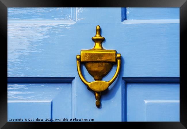 Door with brass knocker in the shape of a hand, be Framed Print by Q77 photo