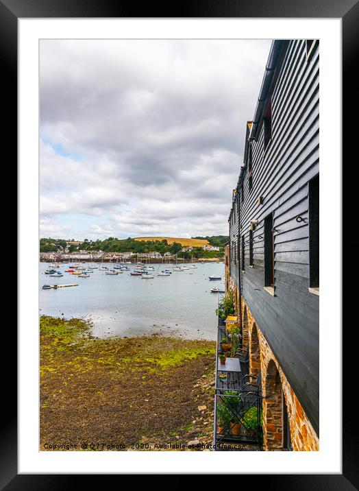 Boats and ships moored in a small port, in the bac Framed Mounted Print by Q77 photo