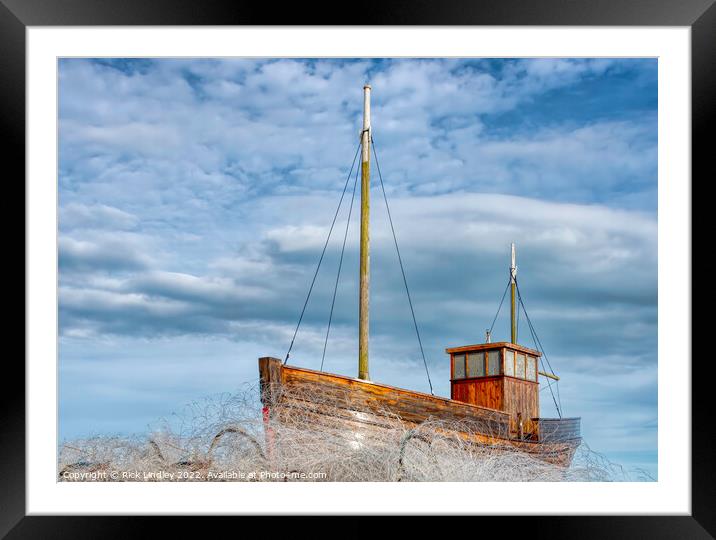 A Fishing Boat On A Sea Of Fishing Nets Framed Mounted Print by Rick Lindley