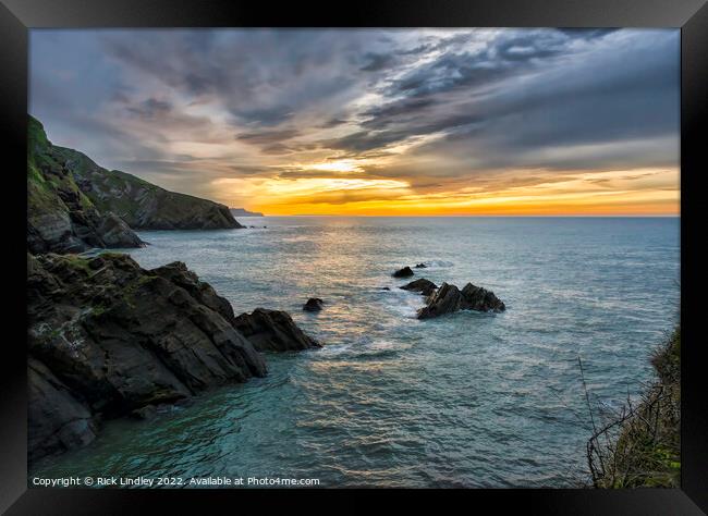 Sunset Over Lundy Island Framed Print by Rick Lindley