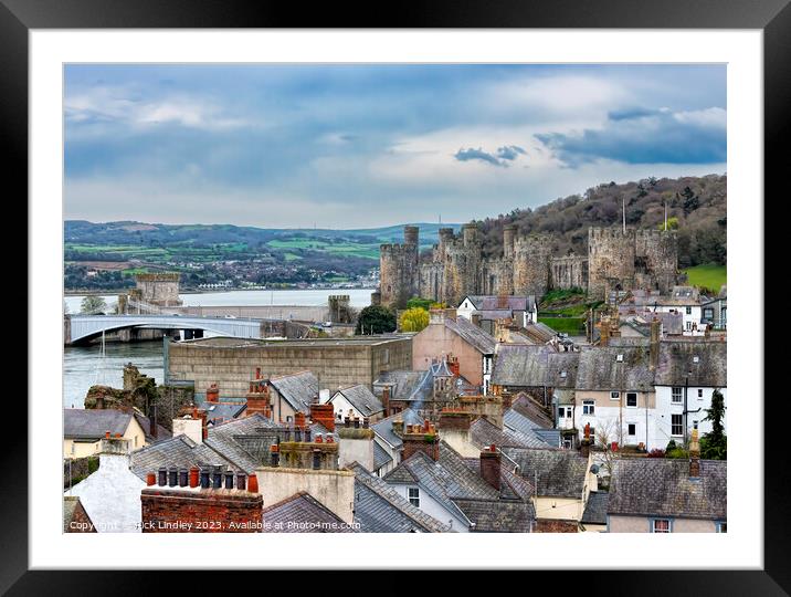 Conwy Castle Over The Rooftops Framed Mounted Print by Rick Lindley