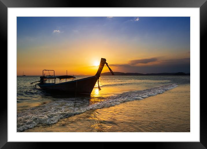 Sunset Scene over sea whit Longtail Boat Framed Mounted Print by Jordan Jelev