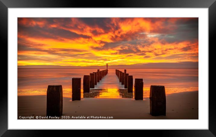 Winter sunrise on Lowestoft Beach Suffolk Framed Mounted Print by David Powley