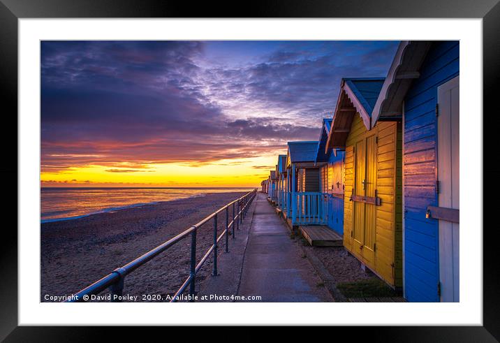 Sunrise over Cromer Beach Huts Framed Mounted Print by David Powley
