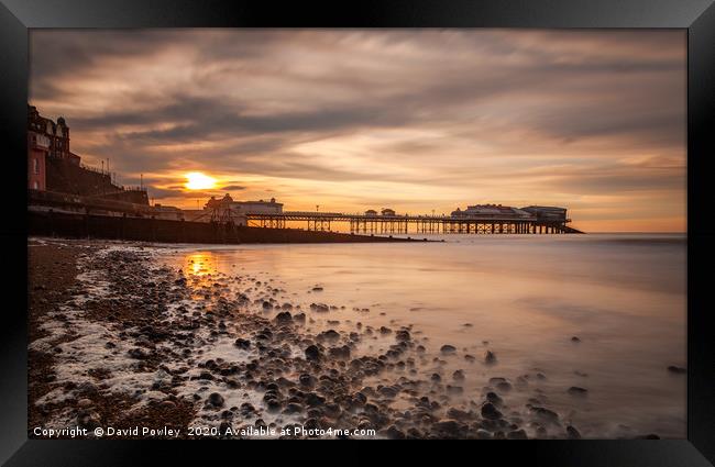Evening light over Cromer Pier Framed Print by David Powley
