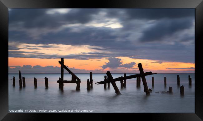 Dawn colour on Happisburgh Beach Framed Print by David Powley