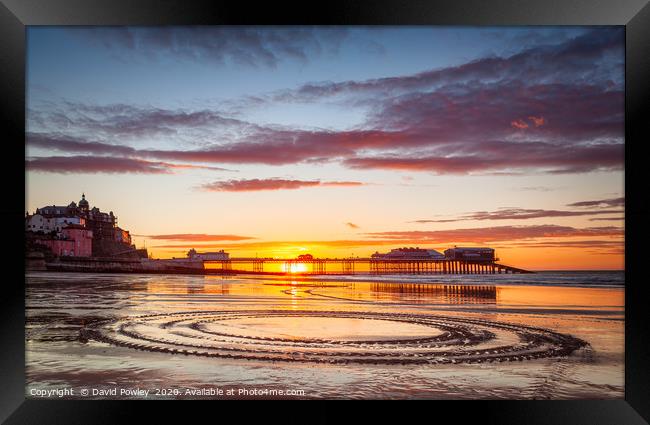 Low tide sunset on Cromer beach Framed Print by David Powley
