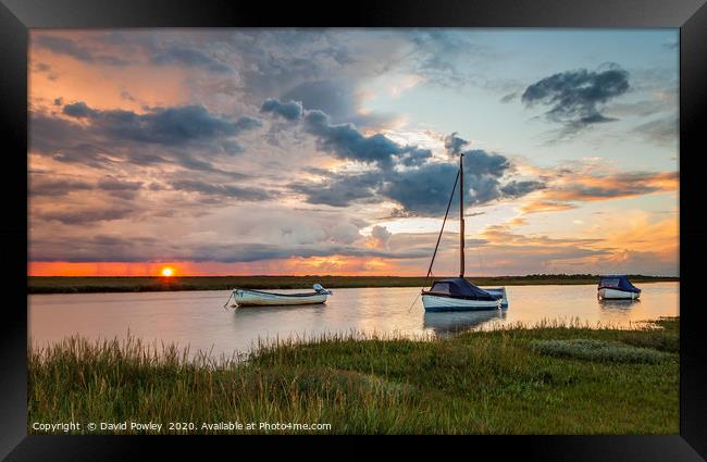 Under stormy sky at Blakeney Framed Print by David Powley