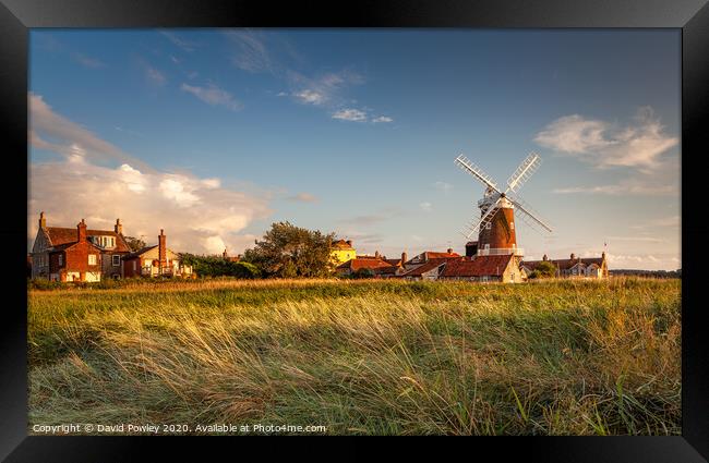 Evening light over Cley Mill Framed Print by David Powley