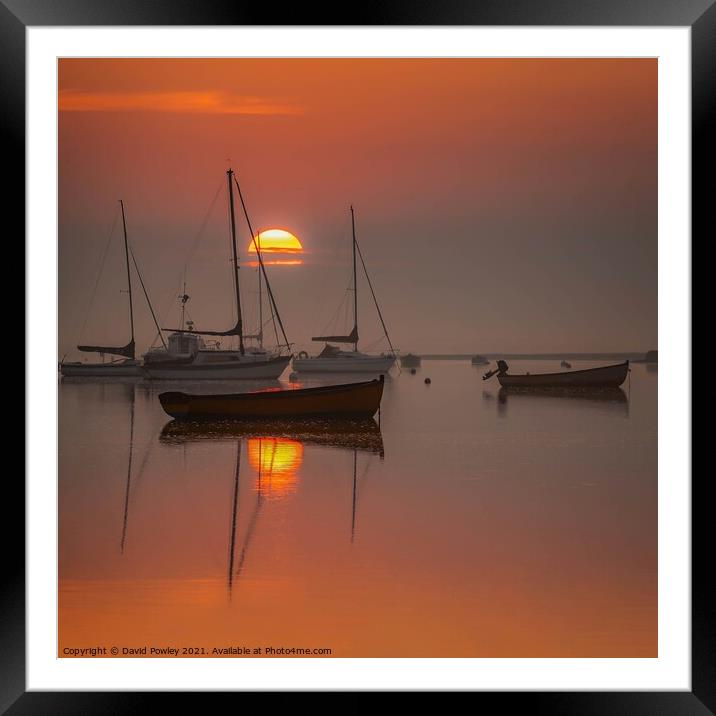 Rising sun at Brancaster Staithe Norfolk Framed Mounted Print by David Powley