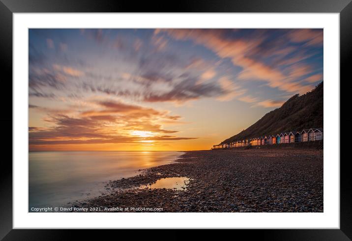 Beach Hut Sunrise on Cromer Beach Norfolk Framed Mounted Print by David Powley