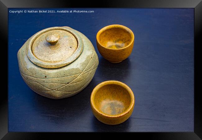 Earthernware Tea Set on Black Table Framed Print by Nathan Bickel