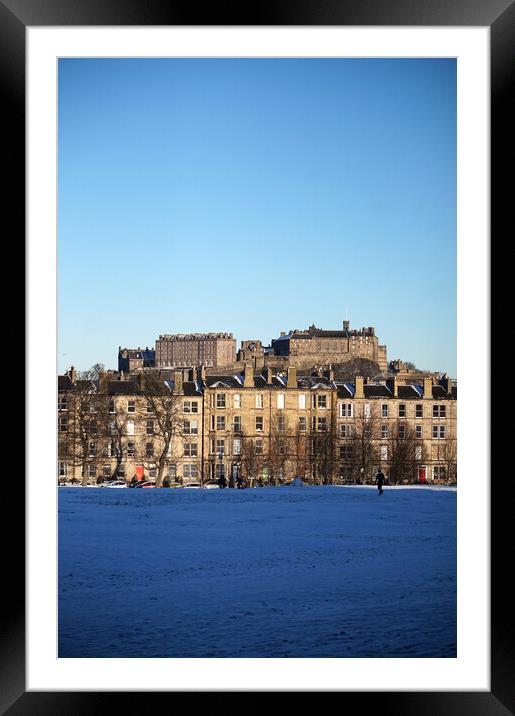 Edinburgh castle behind the snowy park Framed Mounted Print by Theo Spanellis
