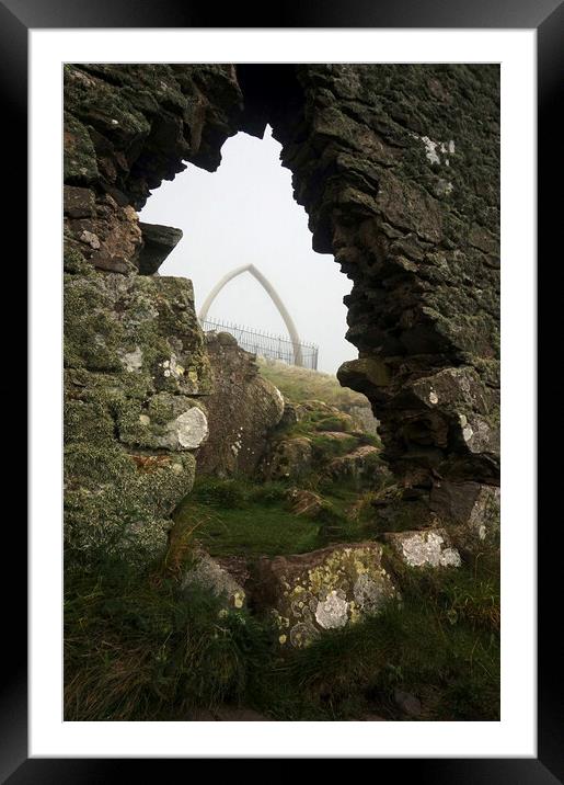 Whale Jaw Bone behind a stone wall Framed Mounted Print by Theo Spanellis