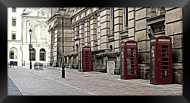 RED PHONE BOXES Framed Print by Sue HASKER