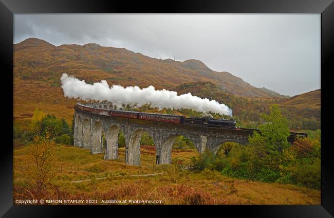 Jacobite Steam Train On Glenfinnan Viaduct In Autu Framed Print by SIMON STAPLEY