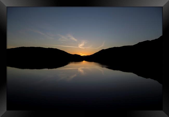 Sunrise over lake at Snowdon, Snowdonia Framed Print by Christopher Stores