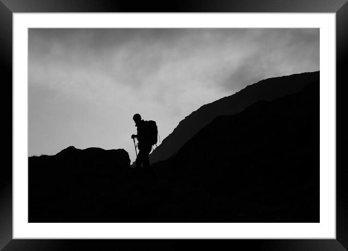 Silhouette of mountain guide  Framed Mounted Print by Christopher Stores
