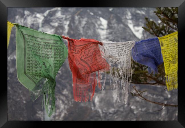Buddhist Prayer Flags in the mountains of Nepal. Framed Print by Christopher Stores