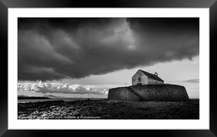Moody Storm over St Cwyfans Framed Mounted Print by Clive Ingram