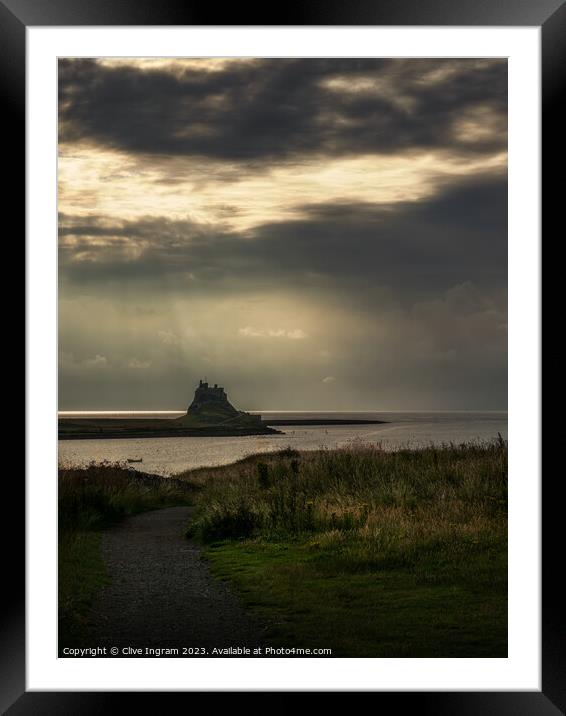Light rays on LindisfarneCastle Framed Mounted Print by Clive Ingram
