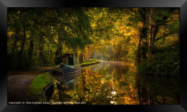 Serene Dawn over Autumnal Canal Framed Print by Clive Ingram