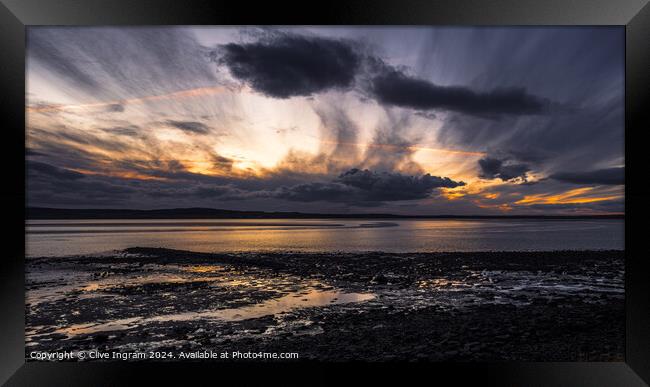 Clouds at sunset Framed Print by Clive Ingram