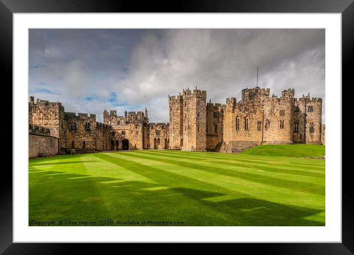 Majestic Alnwick Castle on a Moody Autumn Day Framed Mounted Print by Clive Ingram