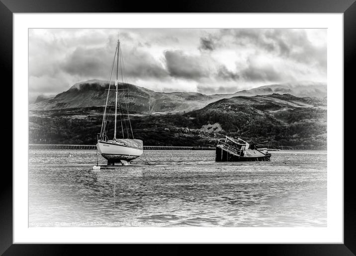 Boats at low tide with mountain backdrop Framed Mounted Print by Clive Ingram