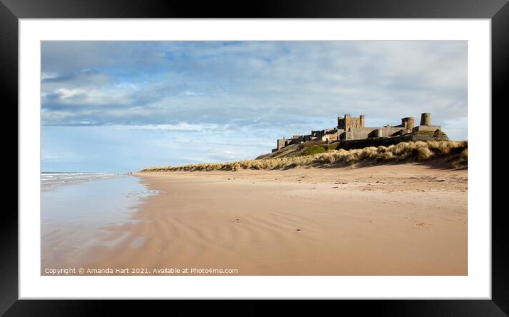 Bamburgh beach and castle, Northumberland Framed Mounted Print by Amanda Hart